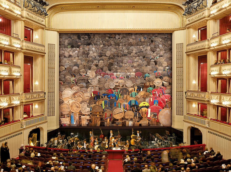 El Anatsui’s XOHANAMI filling the Vienna State Opera stage opening.