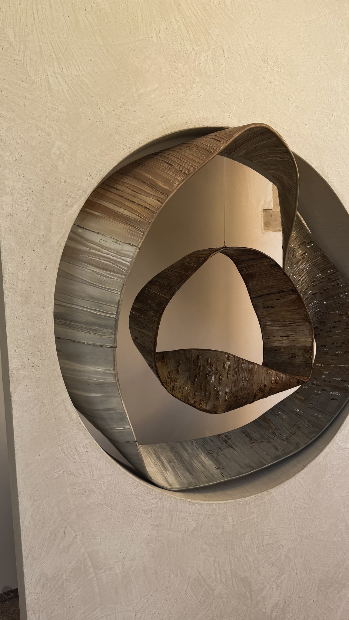 Curves, texture and suspended balance.