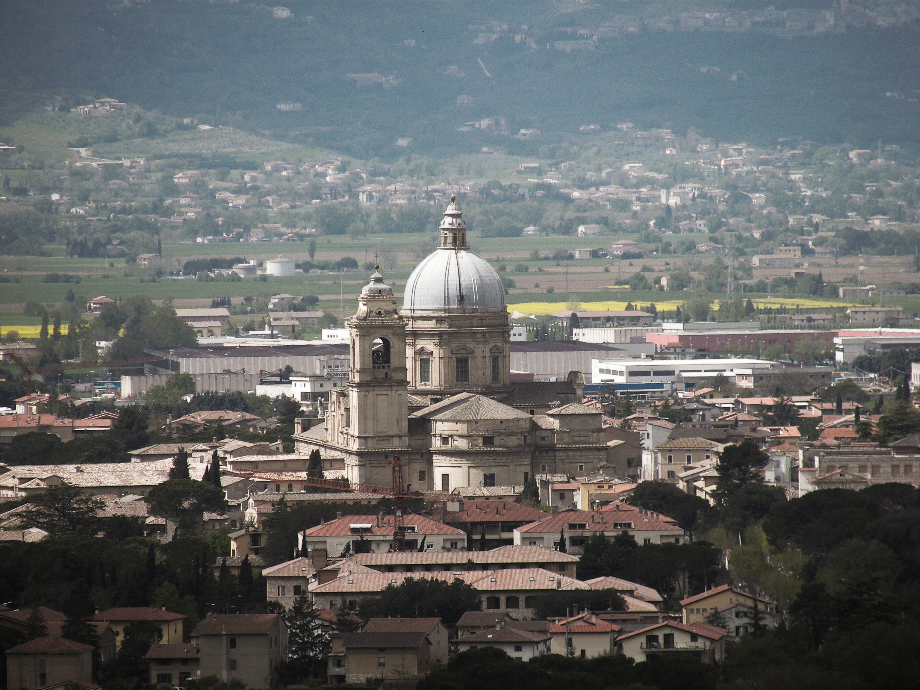 The dome of Santa Maria degli Angeli rising above the Umbrian plain.