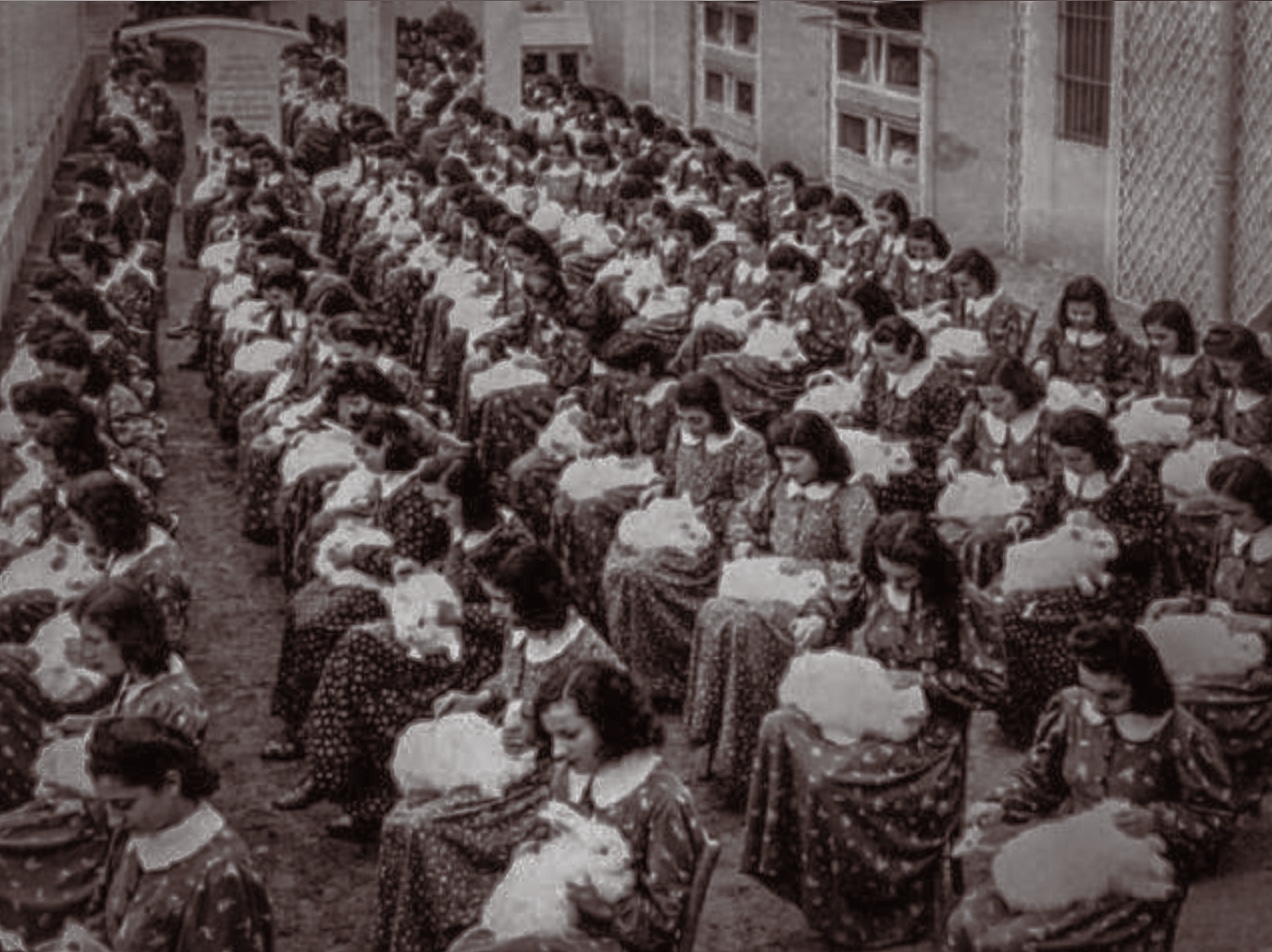 Rows of women handling Angora rabbits at Luisa Spagnoli in 1939.
