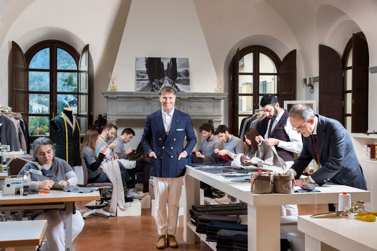 Tailors working on garments at Brunello Cucinelli’s school of crafts in Solomeo.