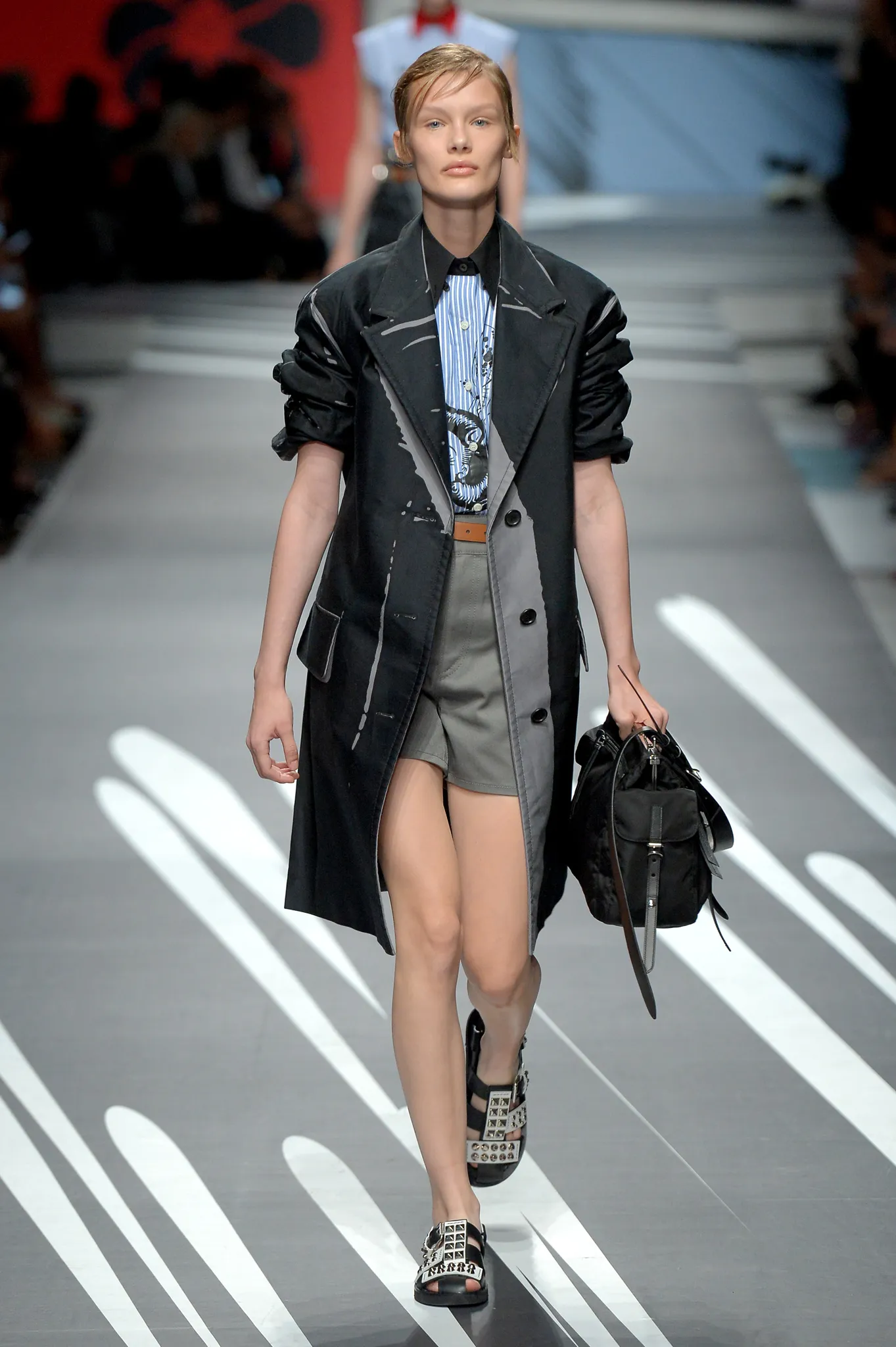 Model wearing a Prada look on the Spring 2018 runway in Milan.